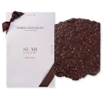 Luxurious Turkish dark chocolate slab with crunchy nuts, presented in elegant packaging from Harem Chocolate, perfect for gifting or indulging.