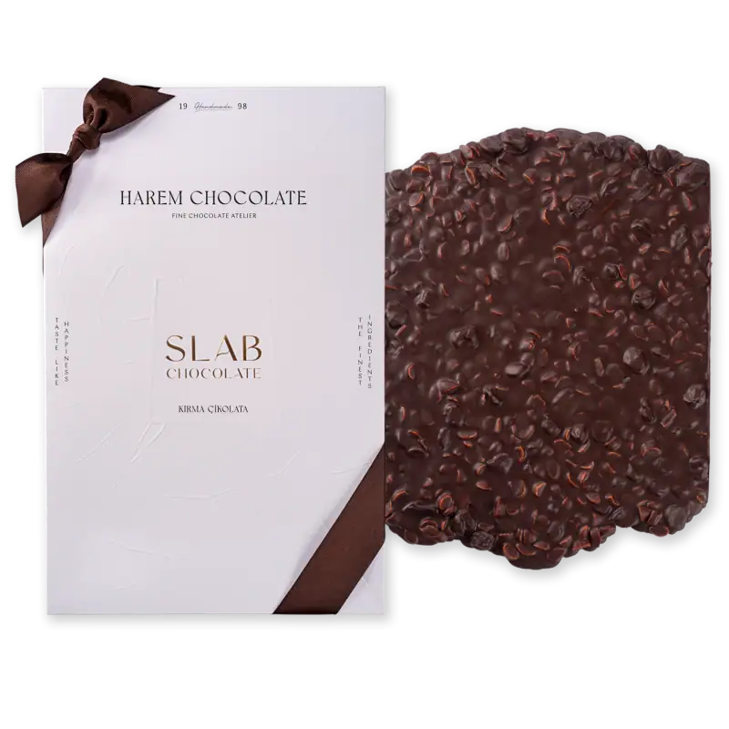 Luxurious Turkish dark chocolate slab with crunchy nuts, presented in elegant packaging from Harem Chocolate, perfect for gifting or indulging.