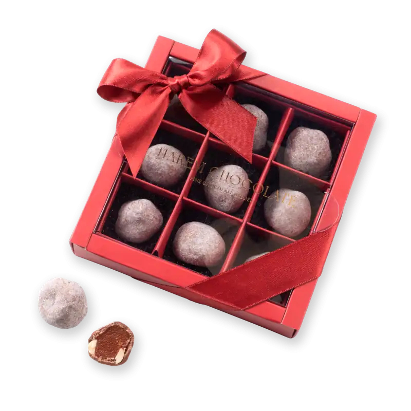 Rich Turkish delight chocolates in a red gift box with a bow, perfect for gifting or indulging, available for fast shipping from Turkey.