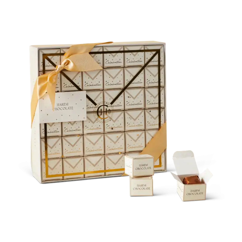 Luxurious gift box of Turkish Harem Chocolate with elegant packaging, gold accents, and an open chocolate box revealing delicious chocolates, perfect for gifting or indulging.