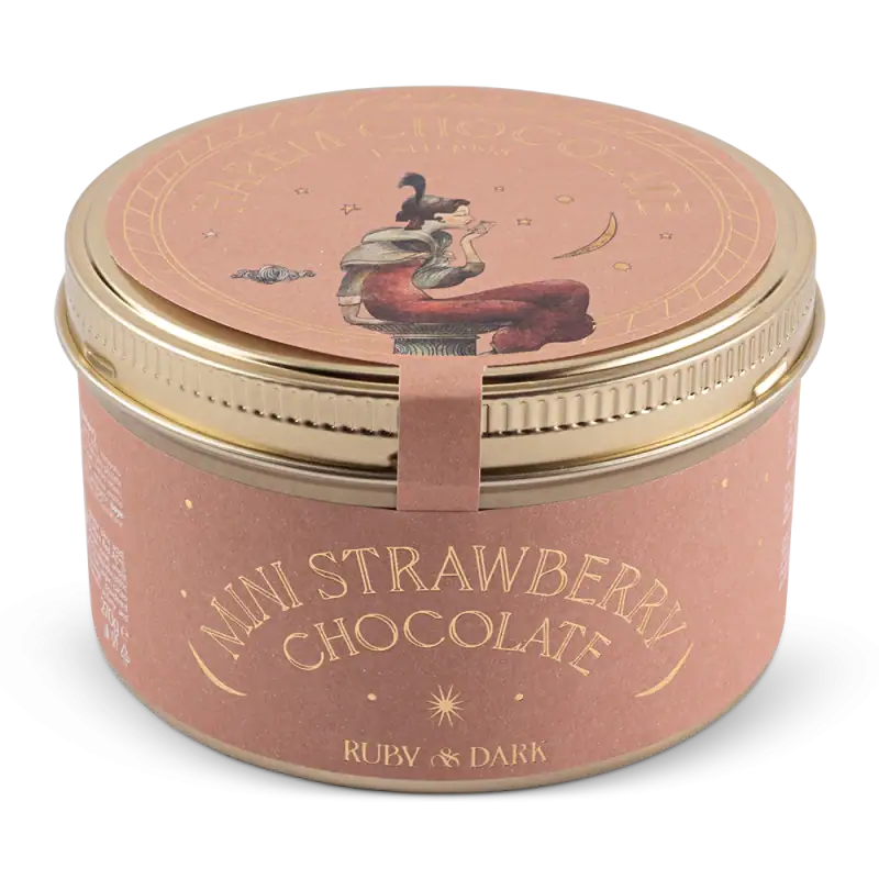 Delicious mini strawberry chocolate in a pink and gold tin, perfect for gifting or enjoying a sweet treat. Ruby and dark chocolate flavors combined in an elegant packaging.