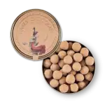 Delicious Turkish caramel candies in a round tin with artistic label featuring a woman and celestial design. Perfect for gifting or enjoying Turkish sweets at home.