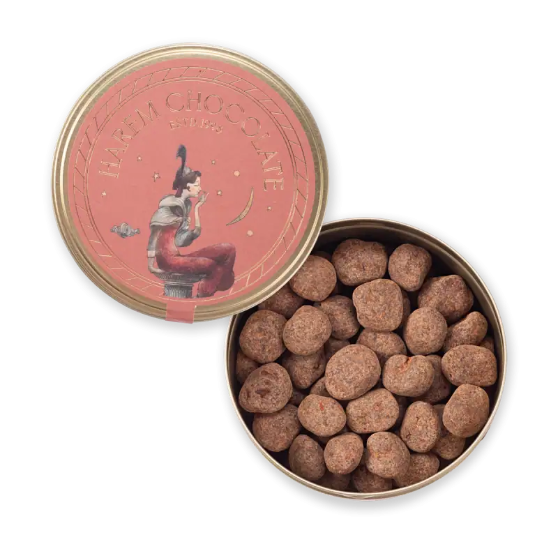 Delicious Turkish chocolate truffles in a round metal tin with pink_label design, perfect for gifting or snacking. Fast shipping available from Shop of Turkey, your source for authentic Turkish treats.