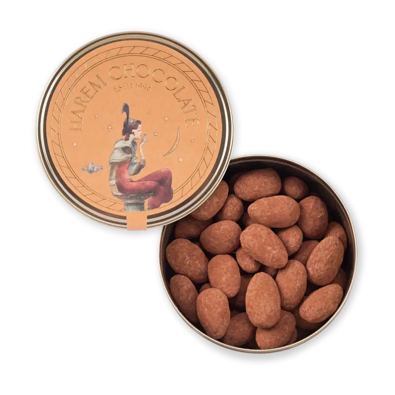 Delicious Turkish chocolate covered nuts in a round tin with vintage-inspired artwork and branding, perfect for gifting or enjoying with coffee.