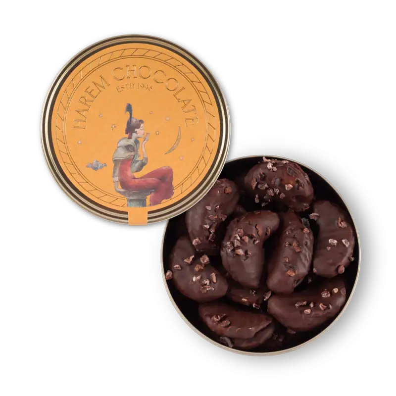 Rich dark chocolate-covered Turkish dates with chopped nuts, perfect for gifting or indulgence, showcasing authentic Turkish confectionery craftsmanship.