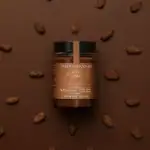 Creamy hazelnut chocolate spread with 75% hazelnuts, made from Ghanaian Kuapa Kokoo cocoa, sugar-free, and perfect for spreading or baking.