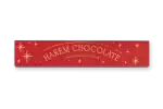 Rich red chocolate box with gold 'Harem Chocolate' branding, festive star accents, perfect for holiday gifting from Turkey.