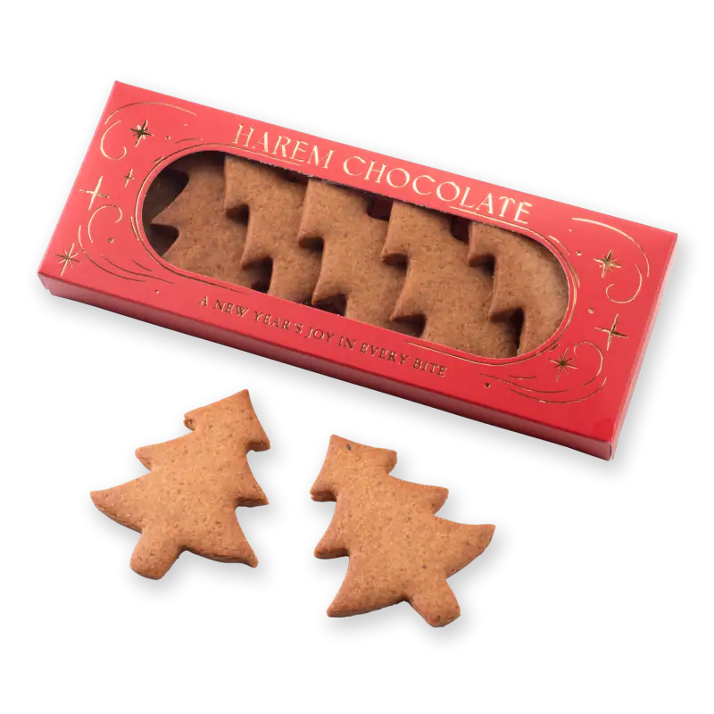 Crunchy Christmas tree-shaped cookies in festive packaging for holiday gifting and celebrations. Perfect for adding a sweet, seasonal touch to your festivities.