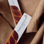 Rich dark chocolate bars with hazelnuts from Turkey, crafted by Hareem Chocolate, showcase premium ingredients and elegant packaging, perfect for gifting or indulging.