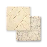 Cream-colored soap with speckled brown particles, featuring a geometric pattern engraved on the surface.