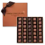 Individually wrapped assorted milk and dark chocolates in a luxury gift box from Harem Chocolate, a fine Turkish chocolatier with fast shipping.