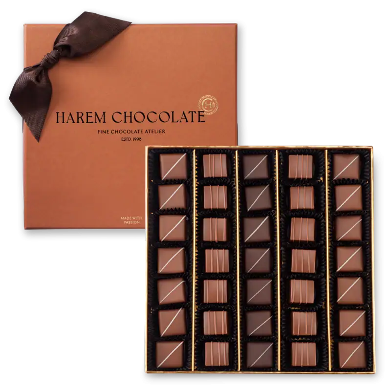 Individually wrapped assorted milk and dark chocolates in a luxury gift box from Harem Chocolate, a fine Turkish chocolatier with fast shipping.