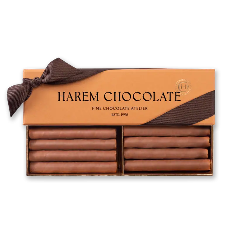 Rich chocolate bars from Harem Chocolate in elegant packaging with a brown ribbon, perfect for gift-giving. Fast shipping from Turkey available.