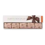 Delicious dark bitter chocolate bars wrapped in elegant packaging with a brown ribbon, ideal for gifting or personal indulgence from Turkey’s premium confectionery.