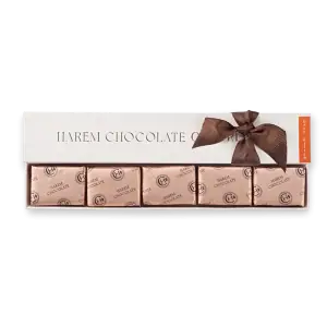 Delicious dark bitter chocolate bars wrapped in elegant packaging with a brown ribbon, ideal for gifting or personal indulgence from Turkey’s premium confectionery.