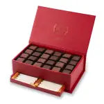 Luxurious Turkish chocolates in a red gift box with a clock design, perfect for special occasions and celebrations. Fast shipping from Turkey available.