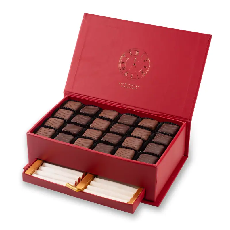 Luxurious Turkish chocolates in a red gift box with a clock design, perfect for special occasions and celebrations. Fast shipping from Turkey available.