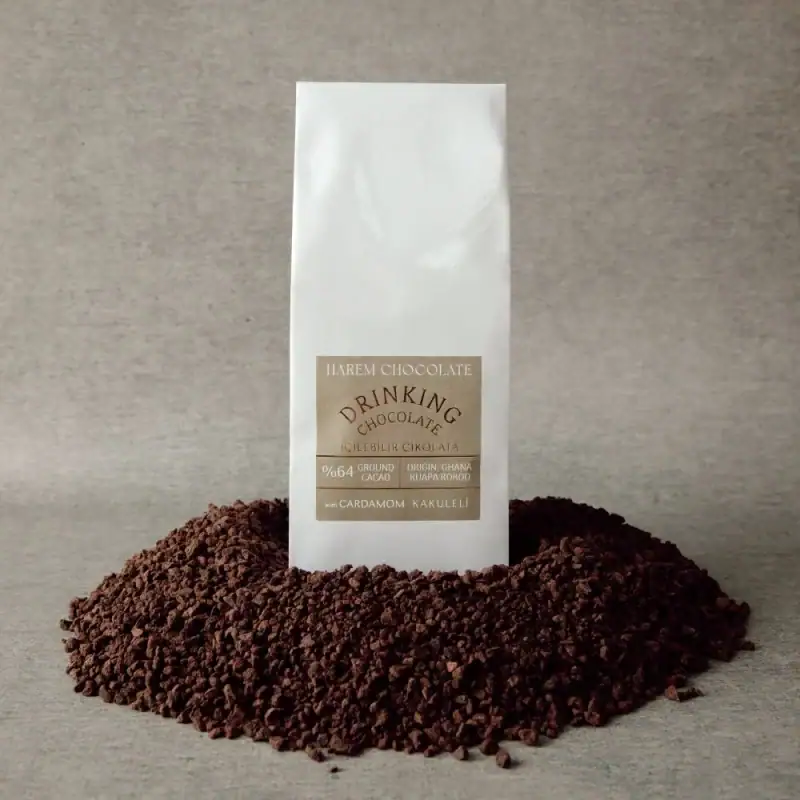 1. Premium Turkish ground cacao in white packaging with cardamom and cloves, sourced from Ghana, 64% cocoa content, perfect for baking and chocolate creations.