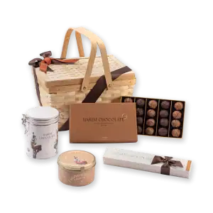 Luxurious Turkish chocolate gift set in a wicker basket with assorted pralines and elegant packaging, perfect for gifting or indulgence from Shop of Turkey.