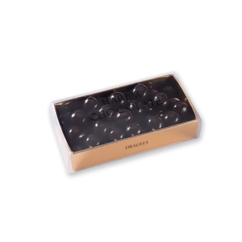 Rich, dark chocolate balls in a elegant gift box from Harem Chocolate, perfect for luxurious treats or special occasions.