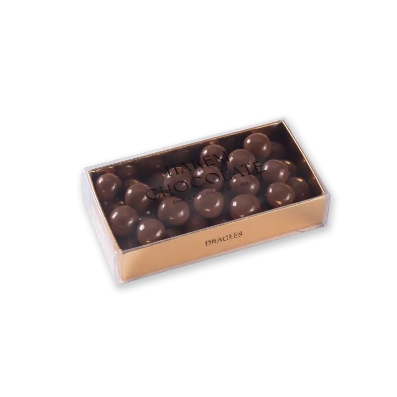 Silky milk chocolate truffles in a transparent box with elegant packaging, perfect for gifting or indulging, from Shop of Turkey for fast shipping worldwide.
