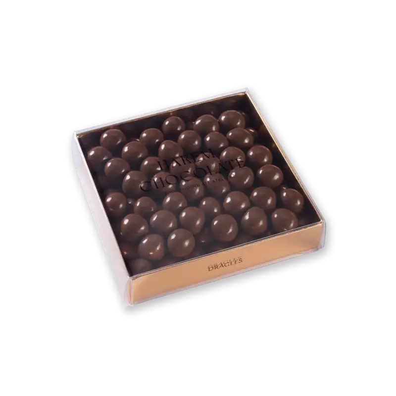 Creamy Turkish chocolate truffles in a clear box, perfect for gifts or indulgence. Enjoy authentic flavors with fast shipping from Turkey. Perfect for chocolate lovers and special occasions.