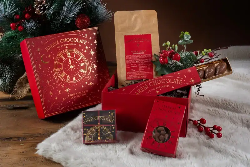 Luxurious Turkish chocolate gift set with holiday-themed packaging, chocolates, and festive decorations, perfect for Christmas and New Year celebrations from Shop of Turkey.