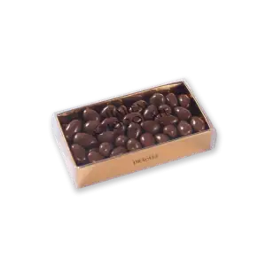Creamy milk chocolate bonbons in a luxurious gold and clear box, perfect for gifting or indulging. Shop now for authentic Turkish chocolate with fast shipping from Turkey.