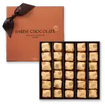 1. Luxurious box of artisanal Harem Chocolate with 24 individually wrapped premium chocolates, perfect for gifting or indulging in fine Turkish chocolate.