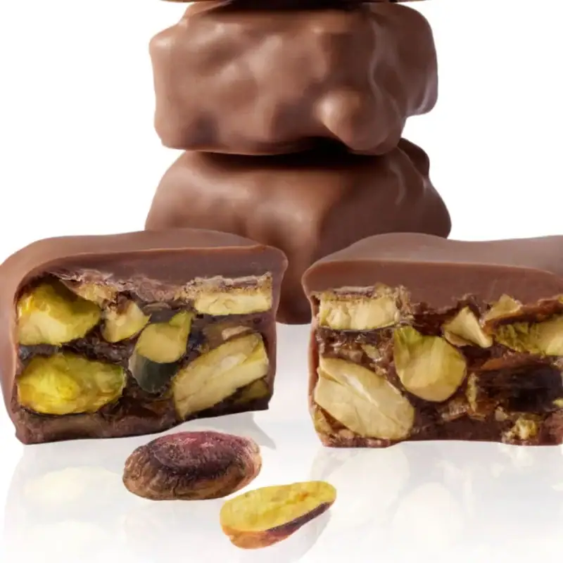 Creamy Turkish chocolate-covered pistachio candies, gourmet treats with rich, smooth chocolate coating and crunchy pistachio center. Perfect for gifting or indulging.