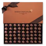 Miniature Turkish candy cubes in a decorative tin container, perfect for gifting or indulging in authentic Turkish treats. Fast shipping from Turkey available.