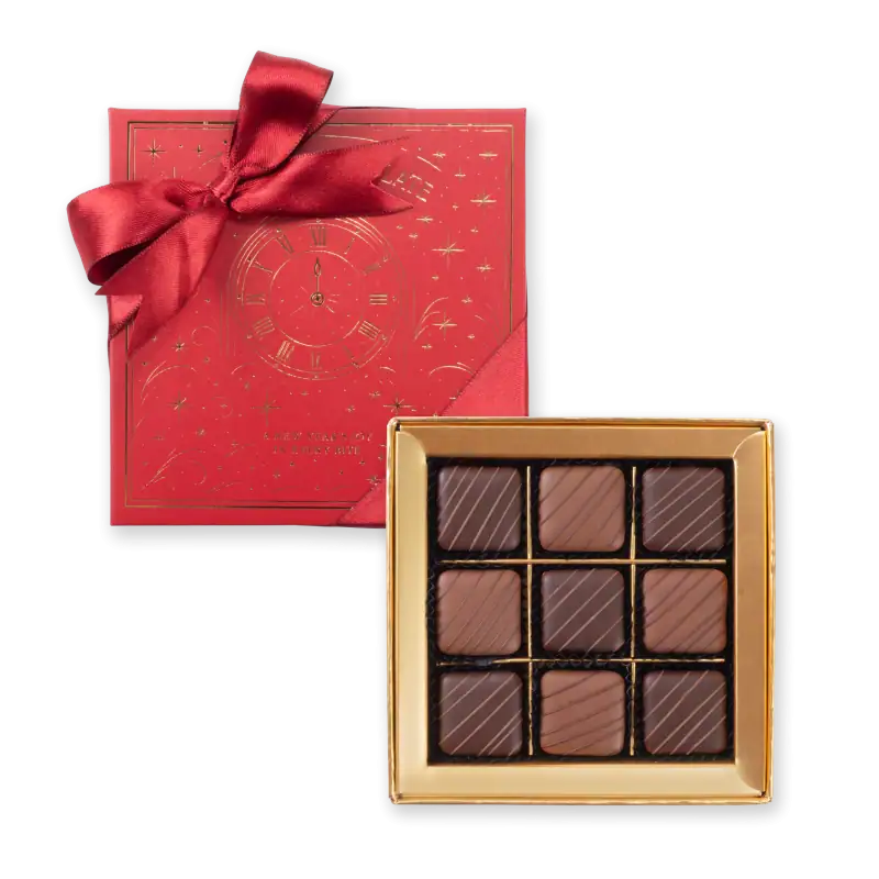 Luxurious box of assorted Turkish chocolates with elegant gold and red packaging, perfect for gifting or celebrating special occasions.