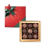 1. Assorted luxury chocolate truffles in a gold box with festive holiday packaging, perfect for gift-giving and celebrations.