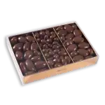 Creamy milk chocolate almonds in a clear box, premium Turkish confectionery, perfect for gifting or enjoying a sweet treat, shipped quickly from Turkey.