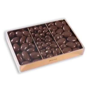 Creamy milk chocolate almonds in a clear box, premium Turkish confectionery, perfect for gifting or enjoying a sweet treat, shipped quickly from Turkey.