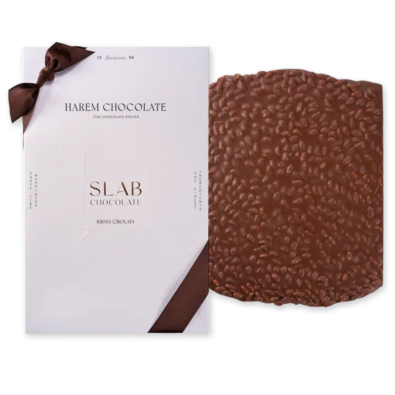 Delicious Turkish slab chocolate with crispy rice, packaged in elegant white box with brown ribbon, perfect for gifts or personal indulgence.