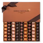 Deluxe Turkish chocolate gift box with assorted chocolates, elegant packaging, and a black ribbon, perfect for gift giving from Turkey.