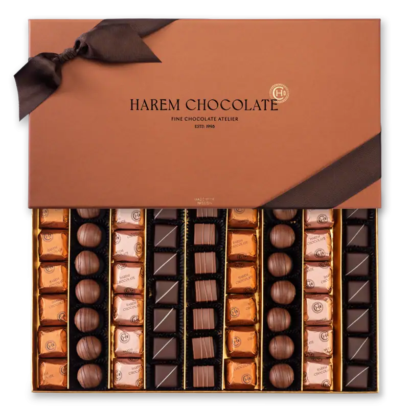 Deluxe Turkish chocolate gift box with assorted chocolates, elegant packaging, and a black ribbon, perfect for gift giving from Turkey.