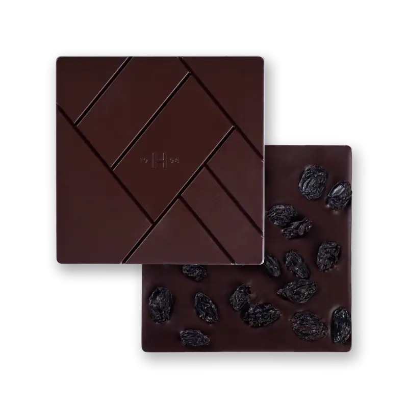 Luxurious dark chocolate bar with raisins, featuring a smooth texture and rich flavor, ideal for gifting or indulgence. Perfectly crafted from premium ingredients for chocolate lovers.