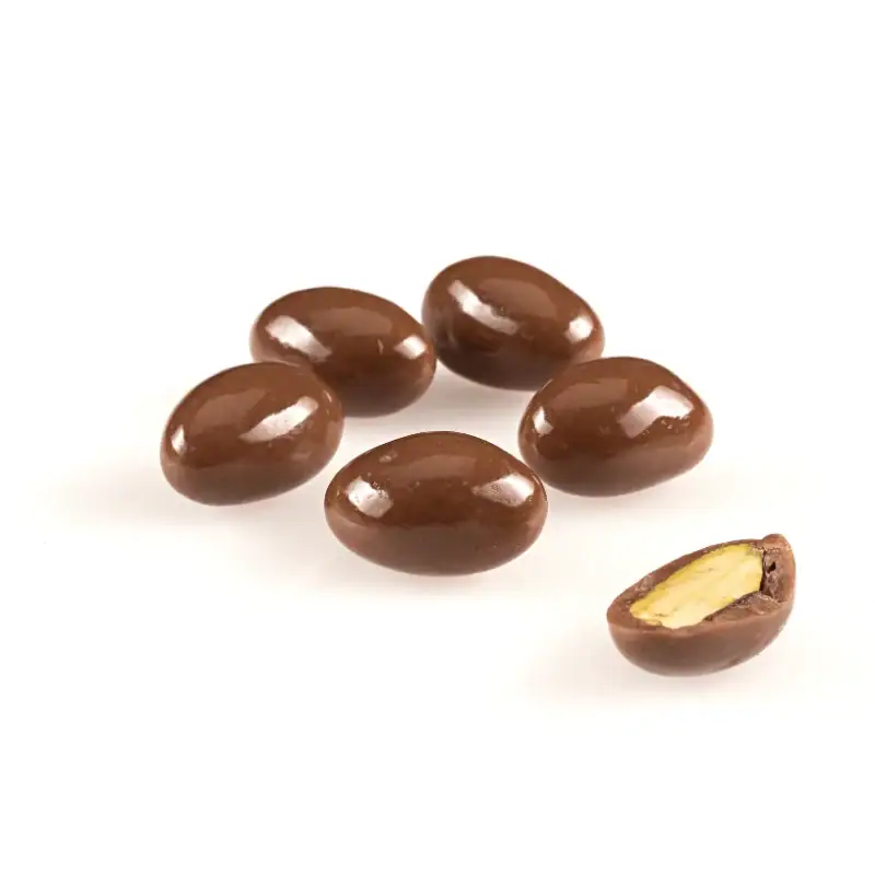 Smooth shiny chocolate-covered almonds with one open revealing the nut inside, perfect for snacking from Turkey.