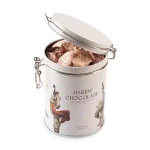 Individually wrapped Harem Chocolate inside a stylish white decorative tin with artistic women illustrations, perfect for gifting or indulging in Turkish fine chocolates.