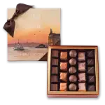 1. Luxurious Turkish chocolates in a decorative gift box with cityscape design, perfect for gifting or indulging in authentic Turkish confections.