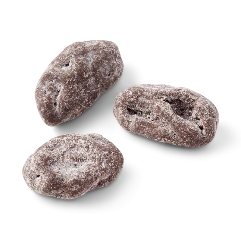 Roasted Turkish-style salted potatoes with a dusty surface on black background.