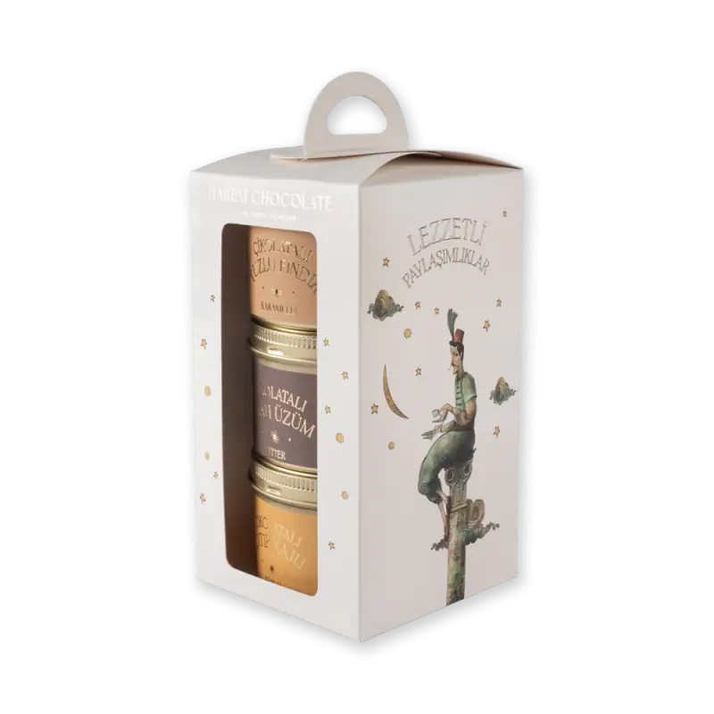 1. Elegant gift set of Turkish flavored spreads and jams in pastel-colored jars, presented in a whimsical storytelling box with charming circus-themed artwork.