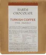Softly roasted Turkish coffee beans on a charming paper bag with elegant Turkish coffee information and nutritional facts, ideal for coffee enthusiasts.