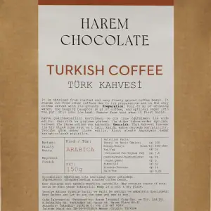 Softly roasted Turkish coffee beans on a charming paper bag with elegant Turkish coffee information and nutritional facts, ideal for coffee enthusiasts.