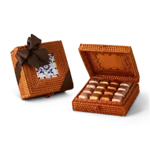 Luxurious woven chocolate gift box with a decorative blue and white tile design and a brown bow, perfect for special occasions from Turkey.