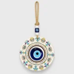Turkish evil eye wall hanging mandala disc held in hand front view