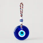 Turkish evil eye nazar blue glass disc on colorful braided cord