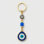 Turkish evil eye keychain with blue nazar pendants and gold-tone chain